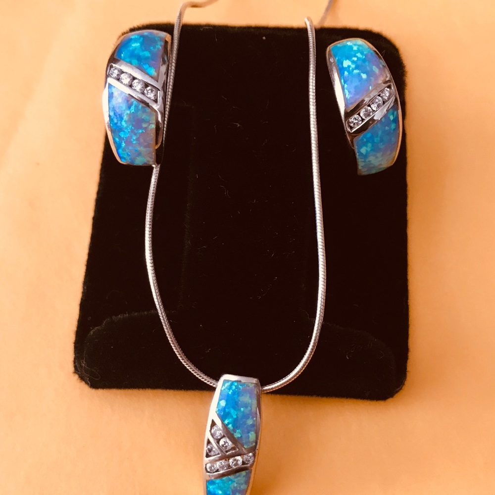 Opal and silver earrings and pendent set